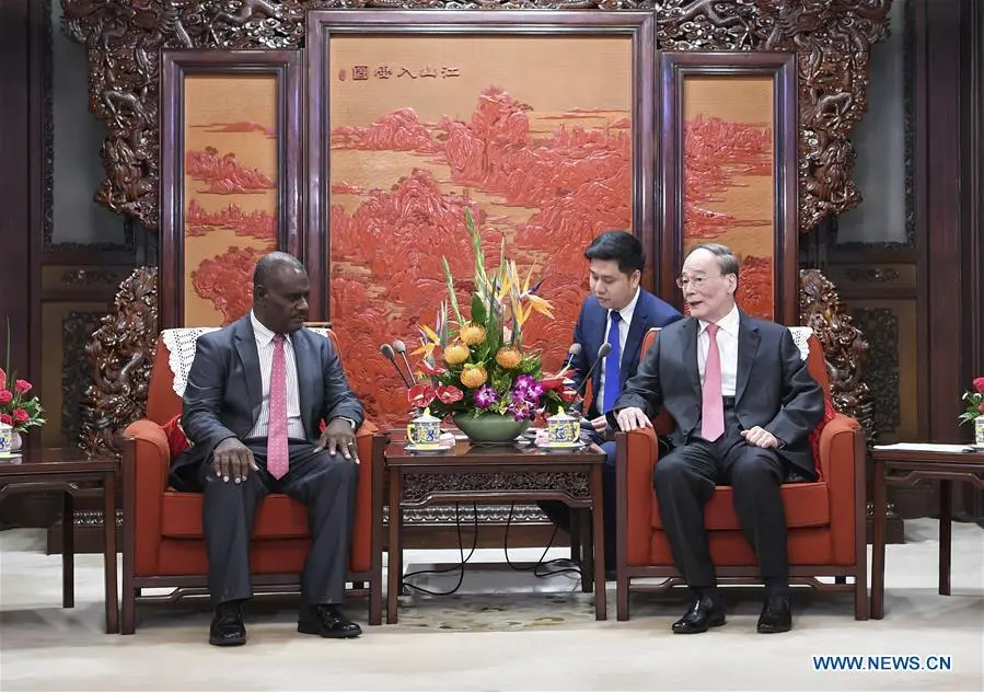 Chinese Vice President Wang Qishan meets with Solomon Islands' Minister of Foreign Affairs and External Trade Jeremiah Manele in Beijing, capital of China, Sept. 23, 2019.