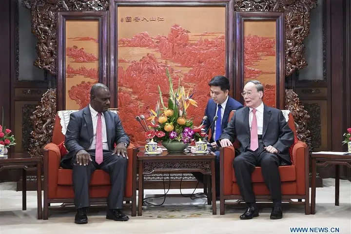 Chinese Vice President Wang Qishan meets with Solomon Islands' Minister of Foreign Affairs and External Trade Jeremiah Manele in Beijing, capital of China, Sept. 23, 2019.