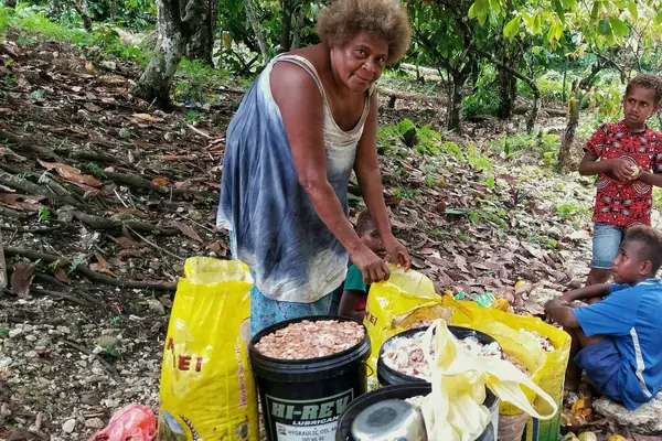 Anna continues to work hard in the plantation, to earn whatever income she can to look after her children.