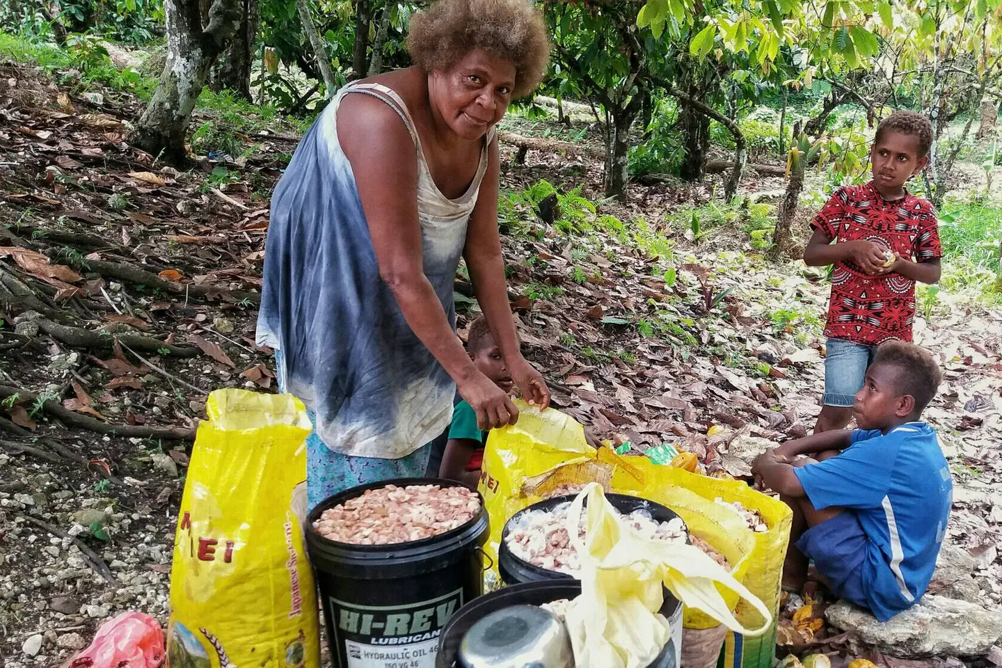 Anna continues to work hard in the plantation, to earn whatever income she can to look after her children.