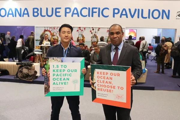 Lead negotiator for Solomon Islands, Dr. Melchior Mataki (R) also calls for the allocation of funding under the Global Environment Facility to increase the climate change focal area and for the co-financing arrangements to be revised to reduce the burden on developing countries.