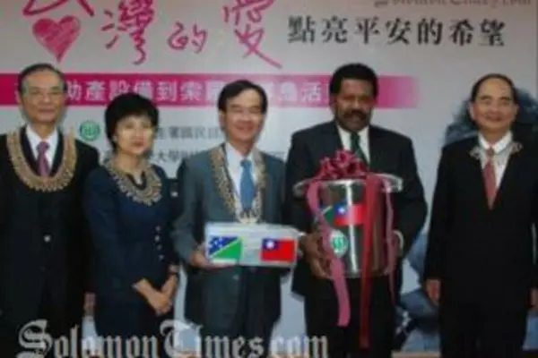 Solomon Islands Ambassador to Taiwan, Victor Ngele, while receiving the items.