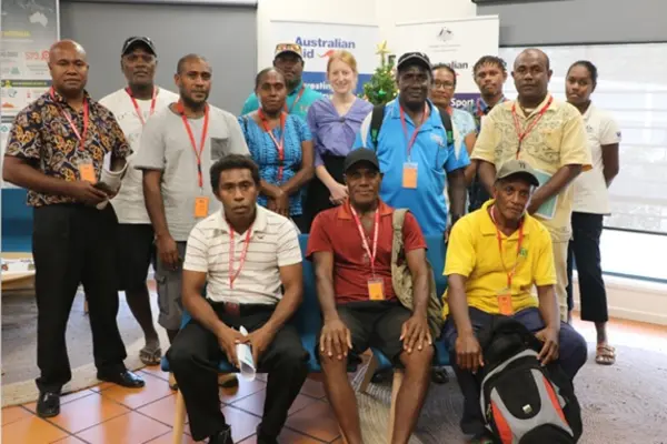 Third Secretary Laura Wilson and DAP Officer Christina Nonga with the Project Coordinators and representatives of the eight DAP-funded projects.