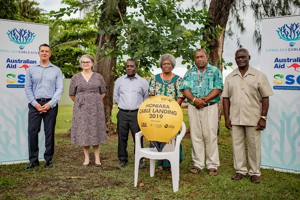 Representatives from Vocus, the Australian High Commission, Honiara, SISCC and traditional landowners association with the Solomon Islands Prime Minister Sogavare during the symbolic handover of the golden bouy.