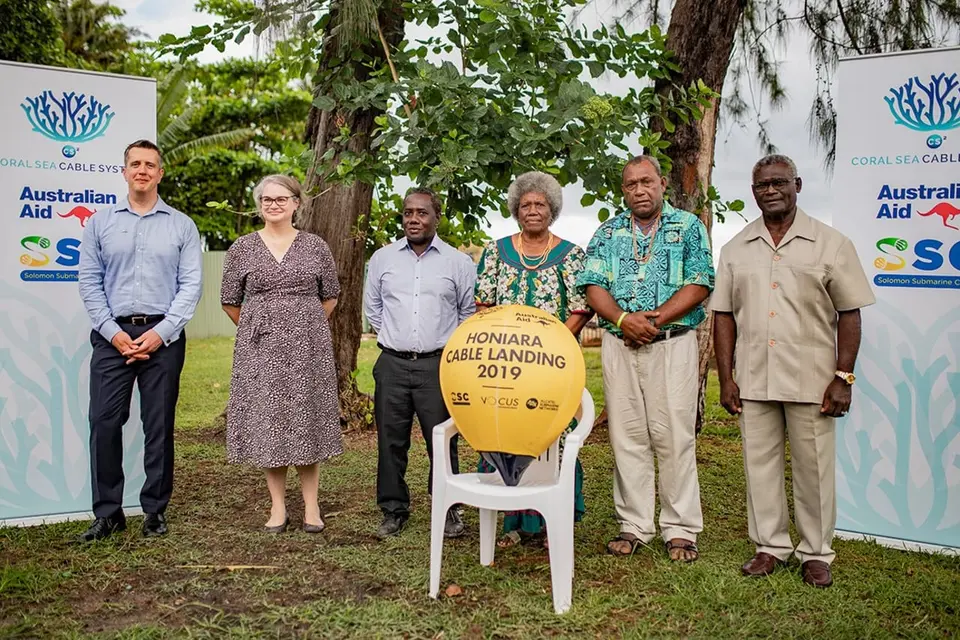 Representatives from Vocus, the Australian High Commission, Honiara, SISCC and traditional landowners association with the Solomon Islands Prime Minister Sogavare during the symbolic handover of the golden bouy.