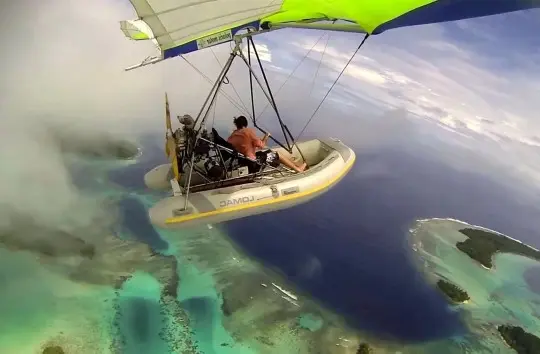 Incredible footage shows the colours of the sea and the islands under Ben. Ben can be seen in the video leaning over the edge of the boat to get photographs.