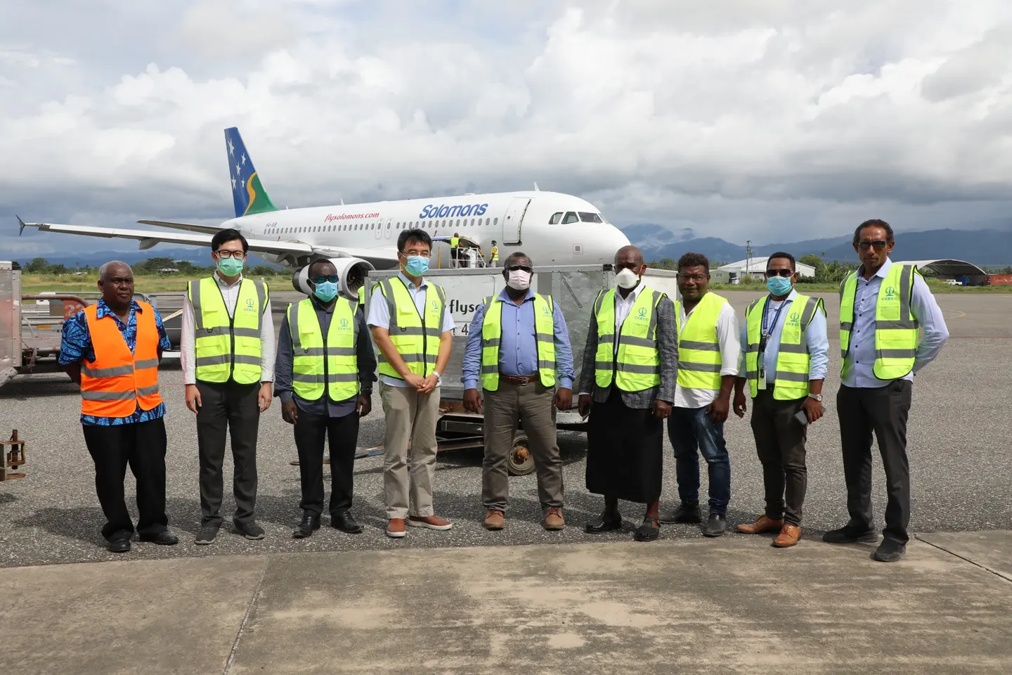 SIG and Chineses Officials witness the arrival of the testing machines at Honiara International Airport.