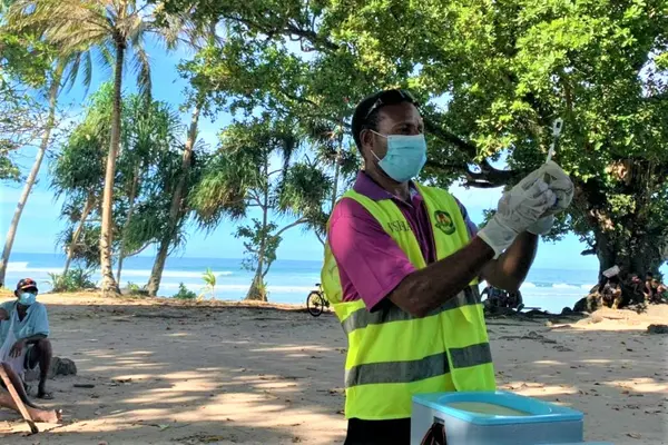Vaccination drive in Waromo Village, West Sepik, Papua New Guinea.