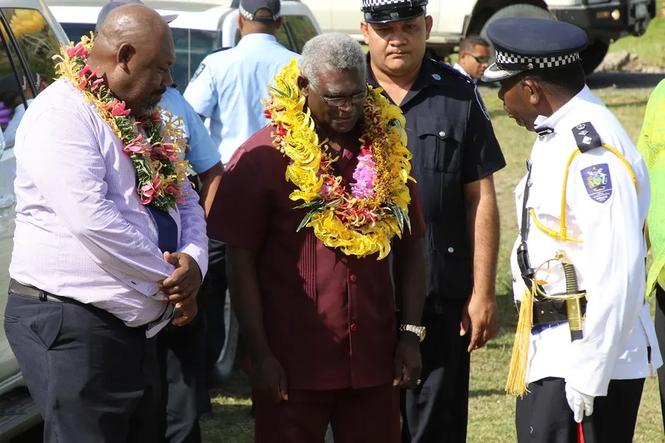 Prime Minister Manasseh Sogavare being met on arrival by the Premier of Guadalcanal.