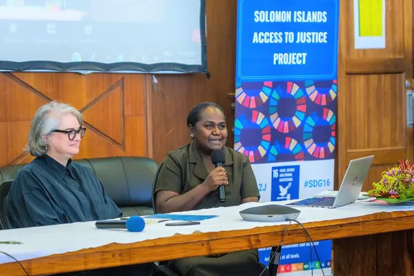 The Acting High Commissioner for Australia to Solomon Islands, Sally-Anne Vincent (left) and the Minister for Education and Human Resources Development, Honourable Lanelle Olandrea Tanangada share their experiences as women leaders and their respective career progressions.