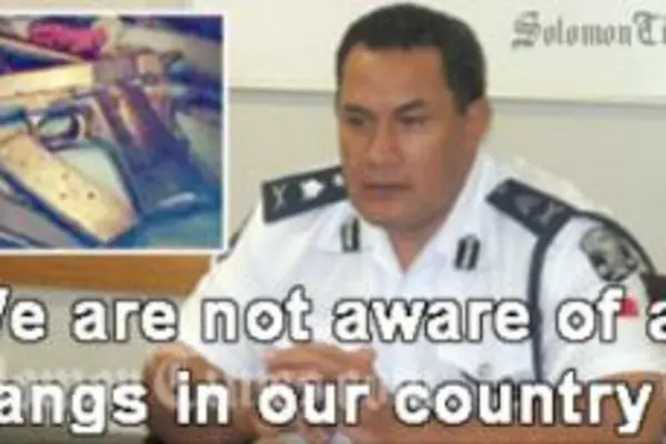 Samoa's Commissioner of Police, Papali'i Lorenese Neru. 
(Inset) Guns sold out of the boot of a car in Samoa