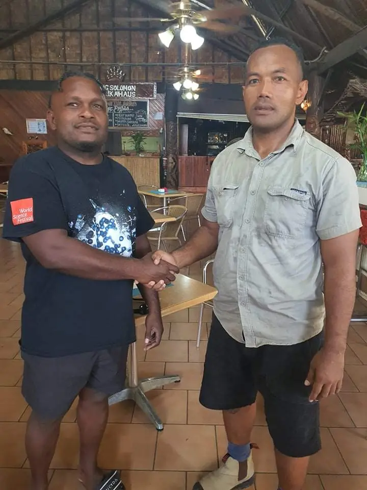 Junior Wale of Malaita Crusaders Rugby Club and Calwyn Tengemoana of Eastern Highlanders Rugby, shook hands after yesterday’s successful meeting to finalise all arrangements for the ‘Warriors Clash’.