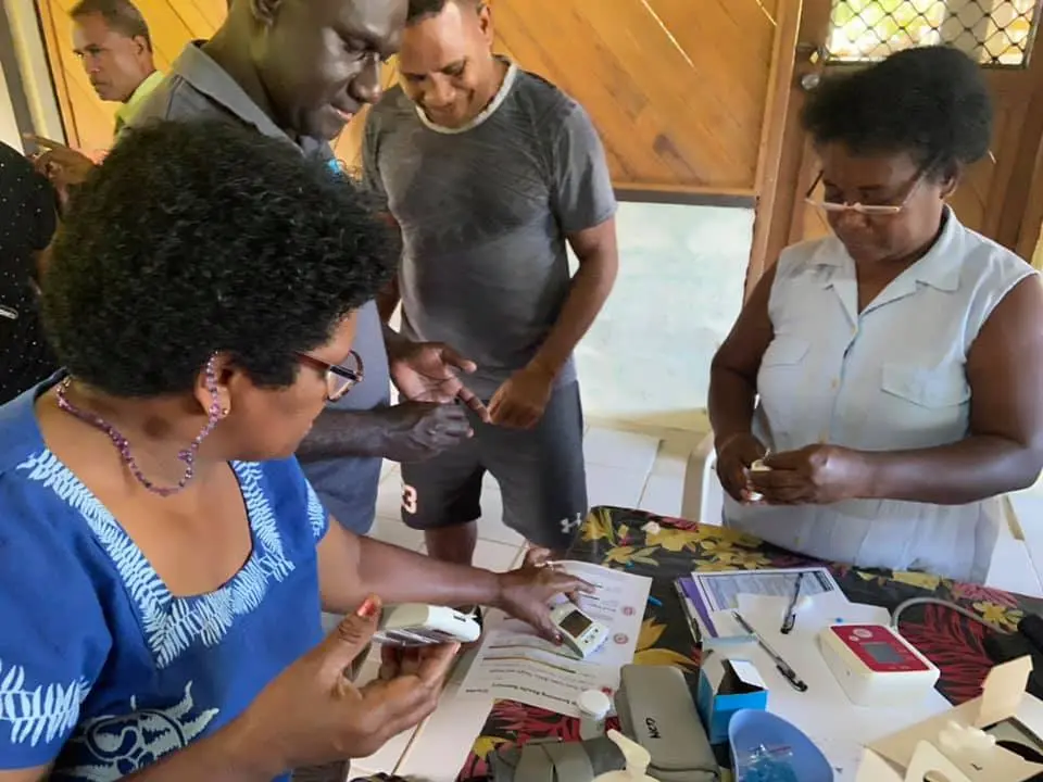Blood sugar test and blood pressure readings being conducted at the Kilu’ufi Hospital in Auki.