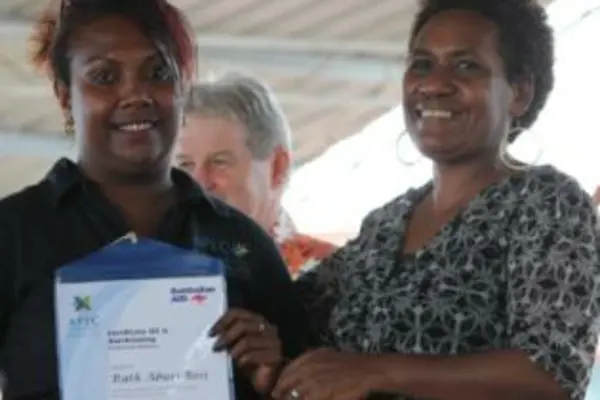 Ruth Bosi(L)receives her certificate from Ms. Afu Billy, Regional Director to the Commonwealth Youth Programme.