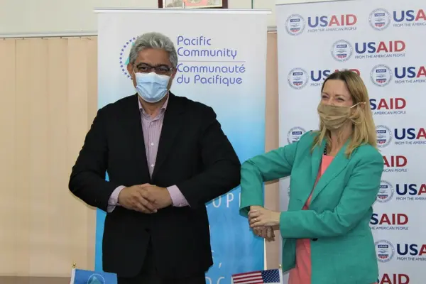 Acting CDA, Miriam Elise Tokumasu de Silva and SPC's Director General Dr. Paula Vivili at the Launch of USAID's PROJECT Governance.