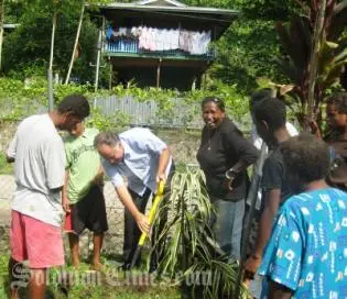 Mr Ingruber and the students planted a tree in the grounds of the Special Development Centre, to improve the environment around the school.