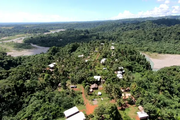 Communities near the Tina Hydro river mouth will relocate as the project progresses.