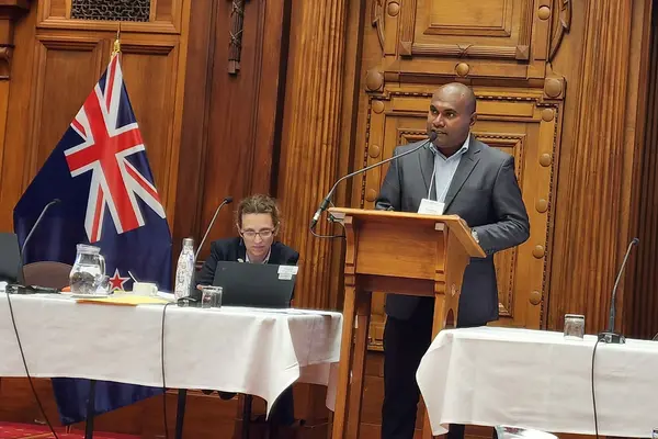MRD Permanent Secretary Dr. Samson Viulu presenting the new and first ever SICD Policy to the meeting audience.