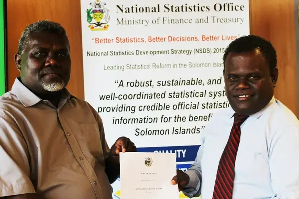 Government Statistician and Census Commissioner, Douglas Kimi (L) and Permanent Secretary for the Ministry of Finance and Treasury, McKinnie Dentana.