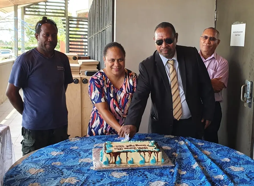 Cutting of the cake by Minister of Fisheries, Hon. Nestor Giro and PROP Coordinator, Samantha Tuti. Looking on SSWA Contractor, Simon Aita'a (left) and PS Fisheries, Dr Christain Ramofafia.