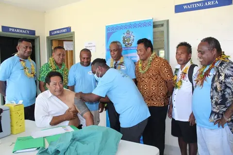 Premier Hon. Willy Tuhagenga taking the first COVID-19 jab for Renbel province.