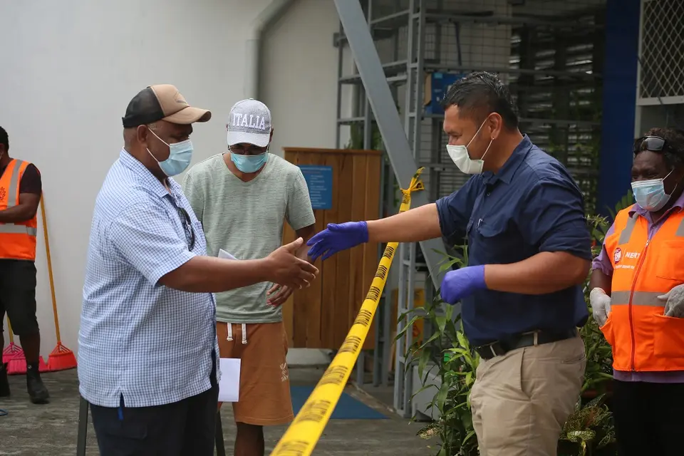 Dr Hou says thank you as he prepares to leave one of the government-managed Access Quarantine Station (QS) last week.