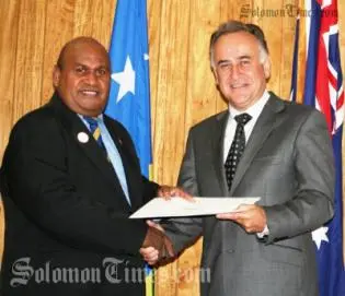 Australia's new High Commissioner to the Solomon Islands, Mr Frank Ingruber presents his official Letter of Introduction to Acting Prime Minister, Honourable Fred Fono.