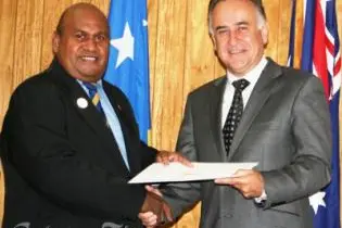 Australia's new High Commissioner to the Solomon Islands, Mr Frank Ingruber presents his official Letter of Introduction to Acting Prime Minister, Honourable Fred Fono.