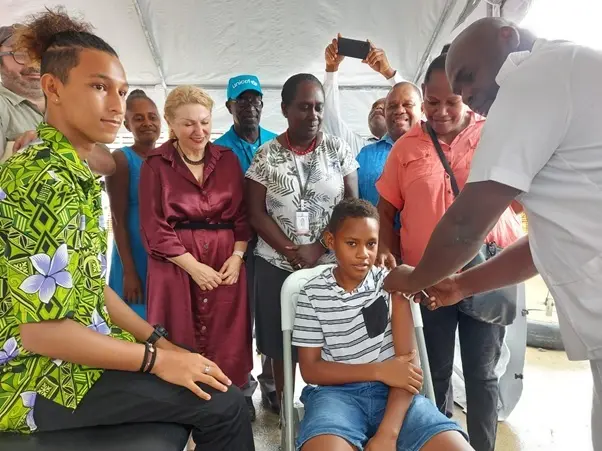 17 years old Joshua Pryor and 12 years old Moses Jr Nokali are the first two to receive the Pfizer vaccine.