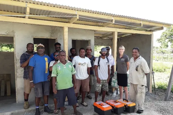 Plumbing training participants and APTC staff - plumbing trainer, James Matariki, and Vocational Training Manager for Vanuatu and Nauru, Natasha Murray.
