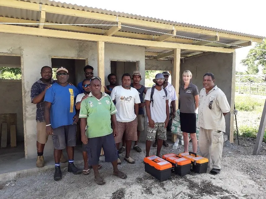 Plumbing training participants and APTC staff - plumbing trainer, James Matariki, and Vocational Training Manager for Vanuatu and Nauru, Natasha Murray.