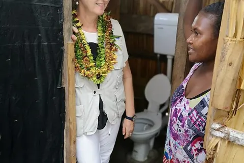 UNICEF Regional Director, Karin Hulshof in Walo community, North Malaita with a local woman.