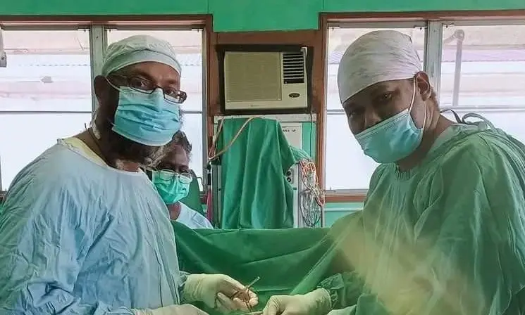 (L-R) Dr. Raymond Dickson & Dr Jason Diau after completing one of the surgeries.