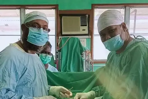 (L-R) Dr. Raymond Dickson & Dr Jason Diau after completing one of the surgeries.