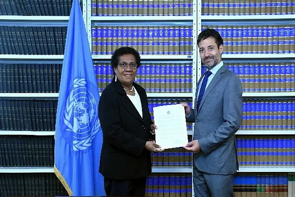 Ambassador and Permanent Representative of Solomon Islands to the United Nations, H.E Mrs. Jane Mugafalu Kabui Waetara and Mr. David Nanopoulos, Chief of the United Nations Treaty Office during the deposit ceremony.