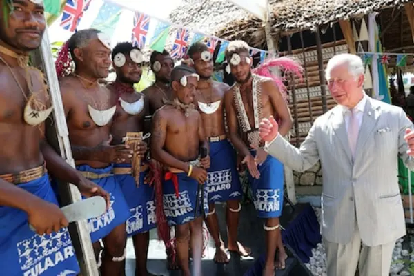 Prince Charles danced with a pan pipe band at the reception at the Governor General's residence.