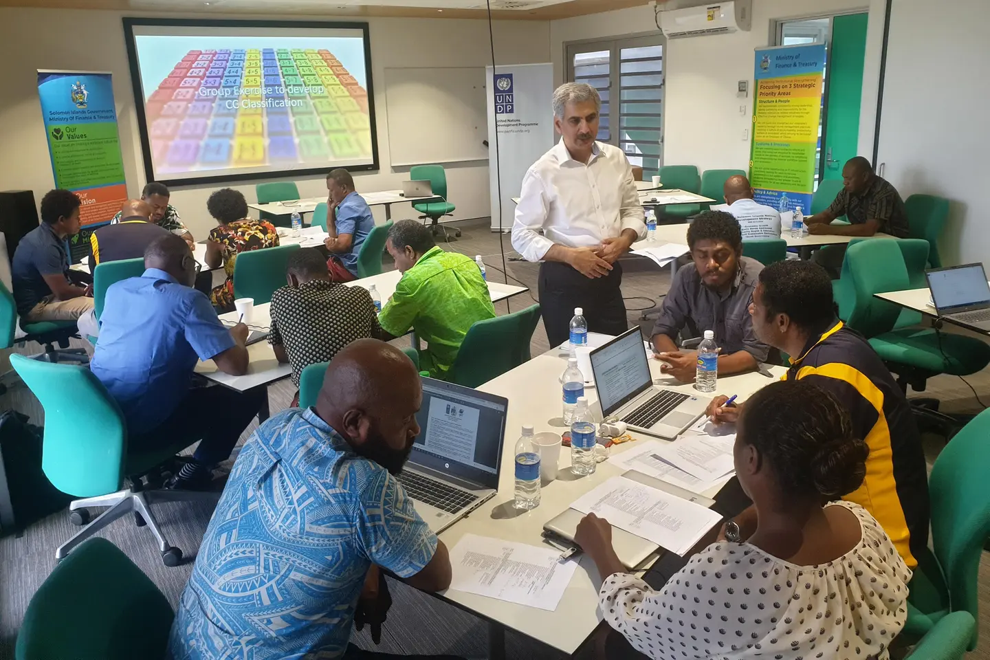 Representatives from MOFT, MECDM, and MNPDC at the Climate Budget Tagging workshop in Honiara.