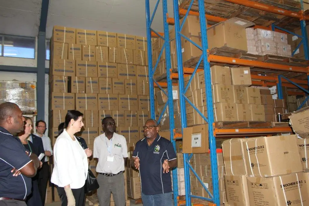 Australian Minister for International Development and the Pacific, the Hon Concetta Fierravanti-Wells, being briefed by Mr Willie Horoto, at the National Medical Store.