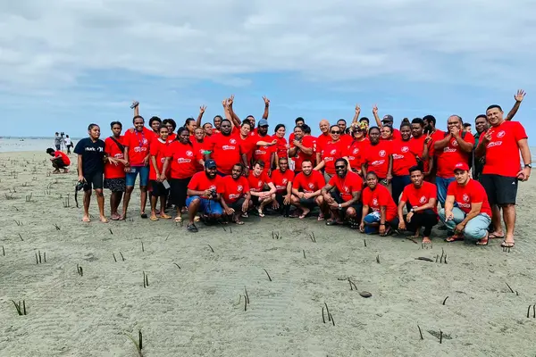 USP Student leaders from 12 member countries and President of New Zealand Union of Students Association at Suva Point in Fiji during the planting of mangroves in August 2019.