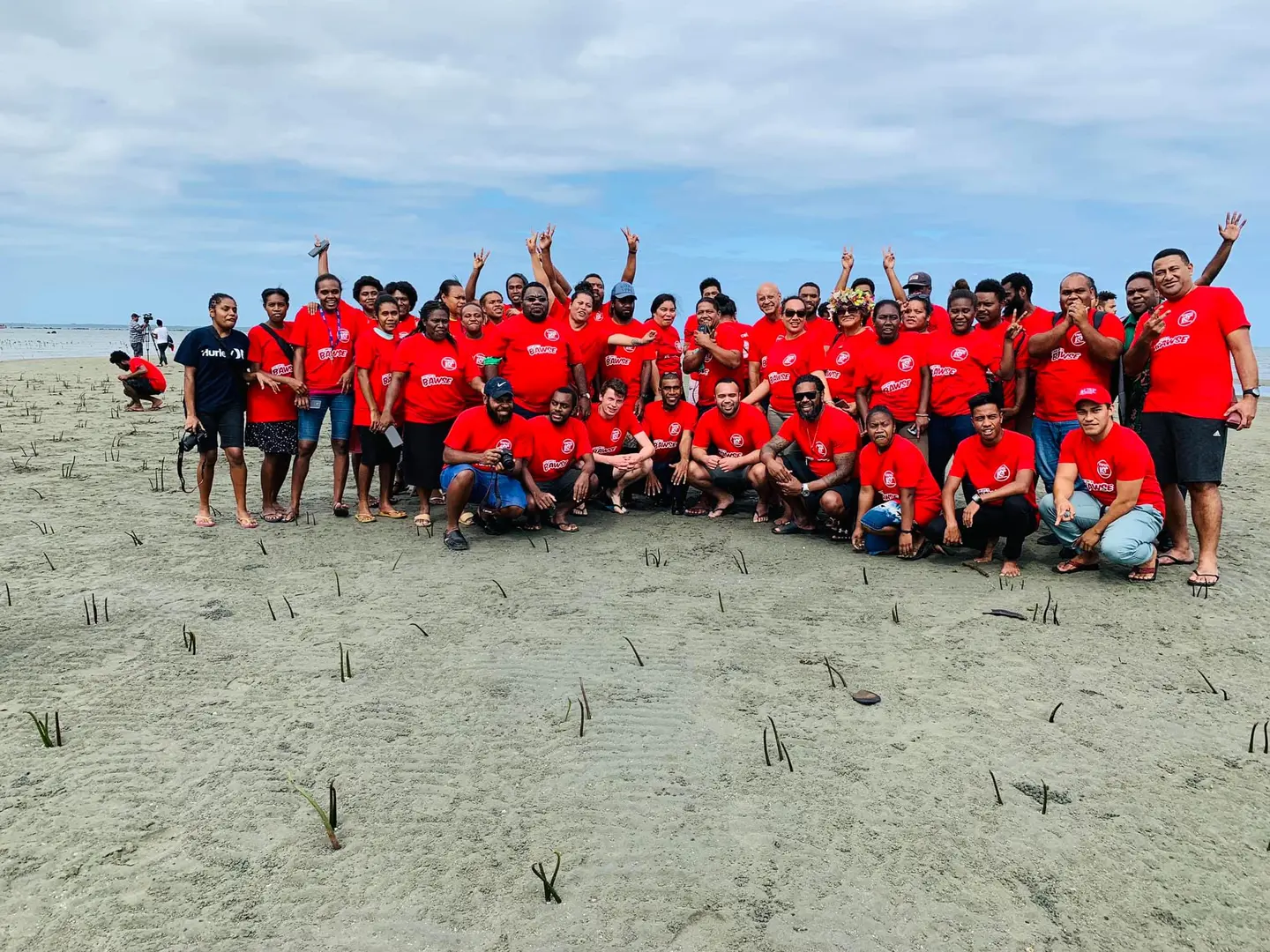 USP Student leaders from 12 member countries and President of New Zealand Union of Students Association at Suva Point in Fiji during the planting of mangroves in August 2019.