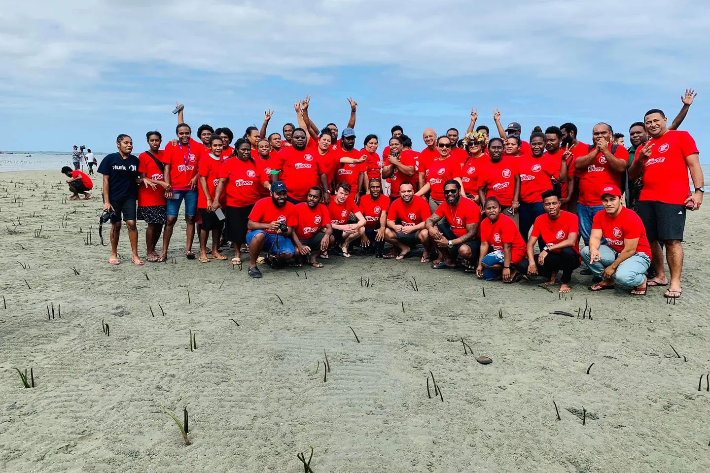 USP Student leaders from 12 member countries and President of New Zealand Union of Students Association at Suva Point in Fiji during the planting of mangroves in August 2019.