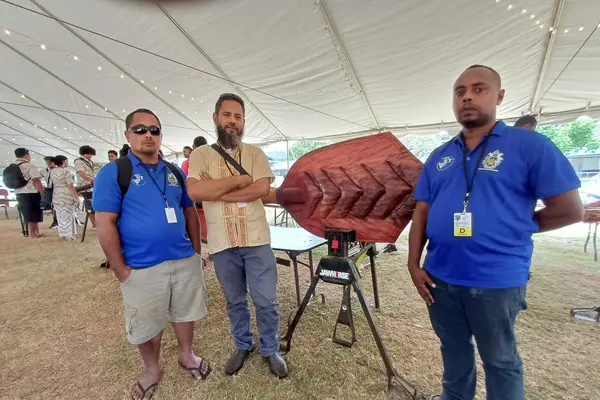 Carved by Riaz Haikiu (C) from Rennell and Bellona Province, the carved paddle was inscribed with both Melanesian and Polynesian motifs representing the diversity of Solomon Islands cultures.