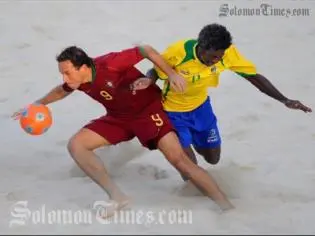 Ze Maria of Portugal sees off a challenge froim Gibson Hosea of the Solomon Islands.
