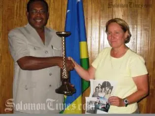 The hand carved wooden candle holder returned to Prime Minister Dr Derek on Saturday, 67 years after it was discovered at a location in the Gela group of Islands by a US Navy during World War II.