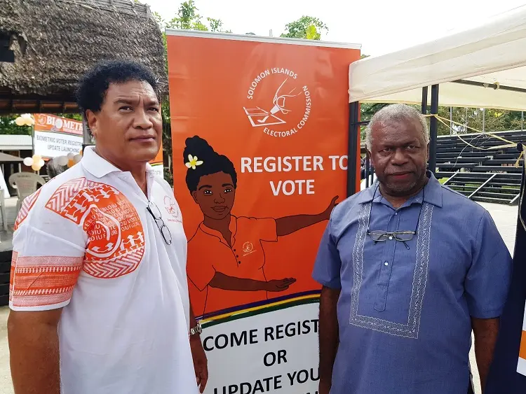 Mr. Mose Saitala, Chief Executive Officer of SIEC (L) and Permanent Secretary of the Ministry of Home Affairs, Mr. George Palua at the launch.
