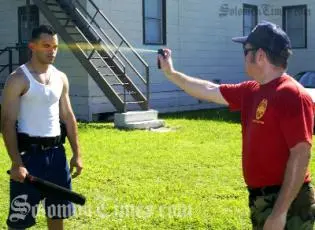 Demonstration of the use of a pepper spray a non-lethal force weapon.