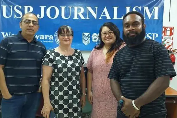 Associate Professor in Pacific Journalism at the School of Pacific Arts, Communication, and Education (SPACE), Shailendra Singh with Journalism teaching assistants.
