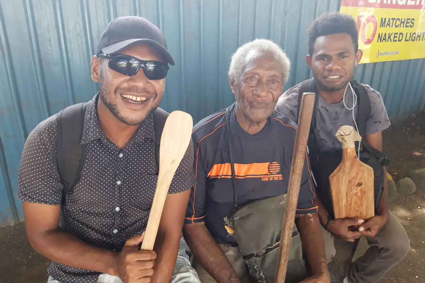 Billy carves wooden spoons, coconut scrapers and other wood work materials to sell for his income.