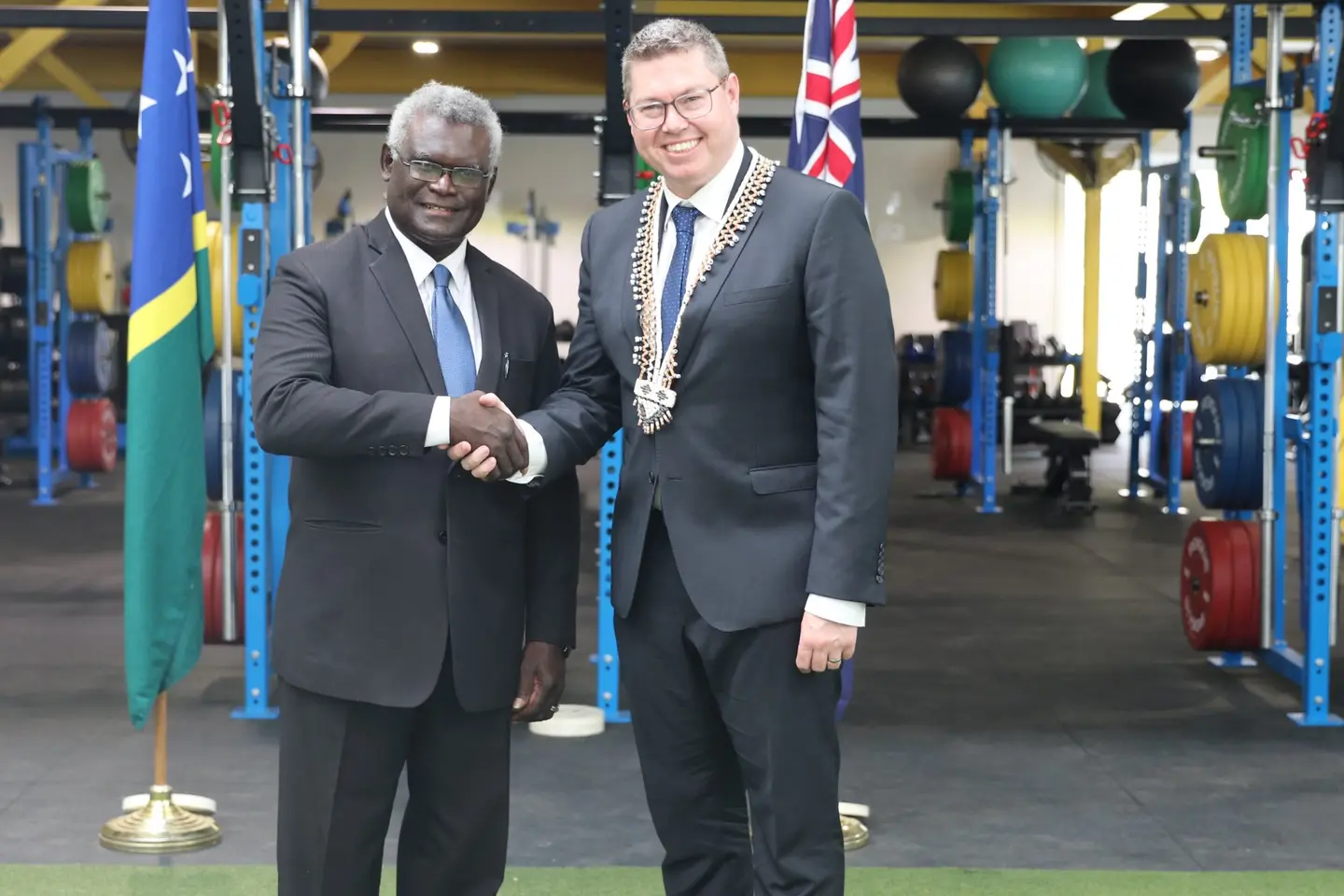 Prime Minister Manasseh Sogavare and Australia's Pacific Minister Pat Conroy at the Sports Institute shortly after making the announcement.