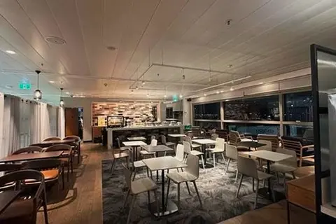 Located away from the bustling terminal, the Plaza Premium Lounge serves as the ideal pre-flight retreat, featuring floor-to-ceiling windows that offer stunning views of the airfield and a serene atmosphere.
